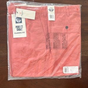 Dockers Men’s Perfect Short. Coral. Size 42 (waist). 10.5 inseam. New with tags.